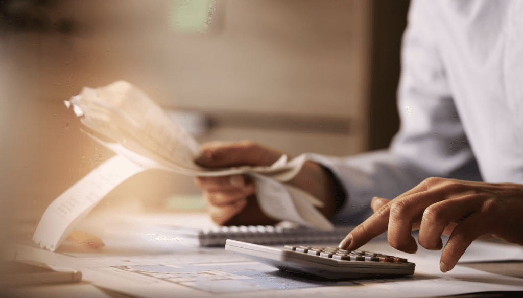 A person calculating some bills