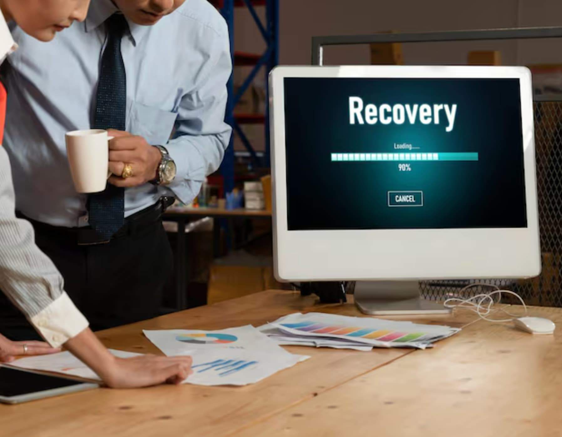 Employees discussing payroll disaster recovery plan