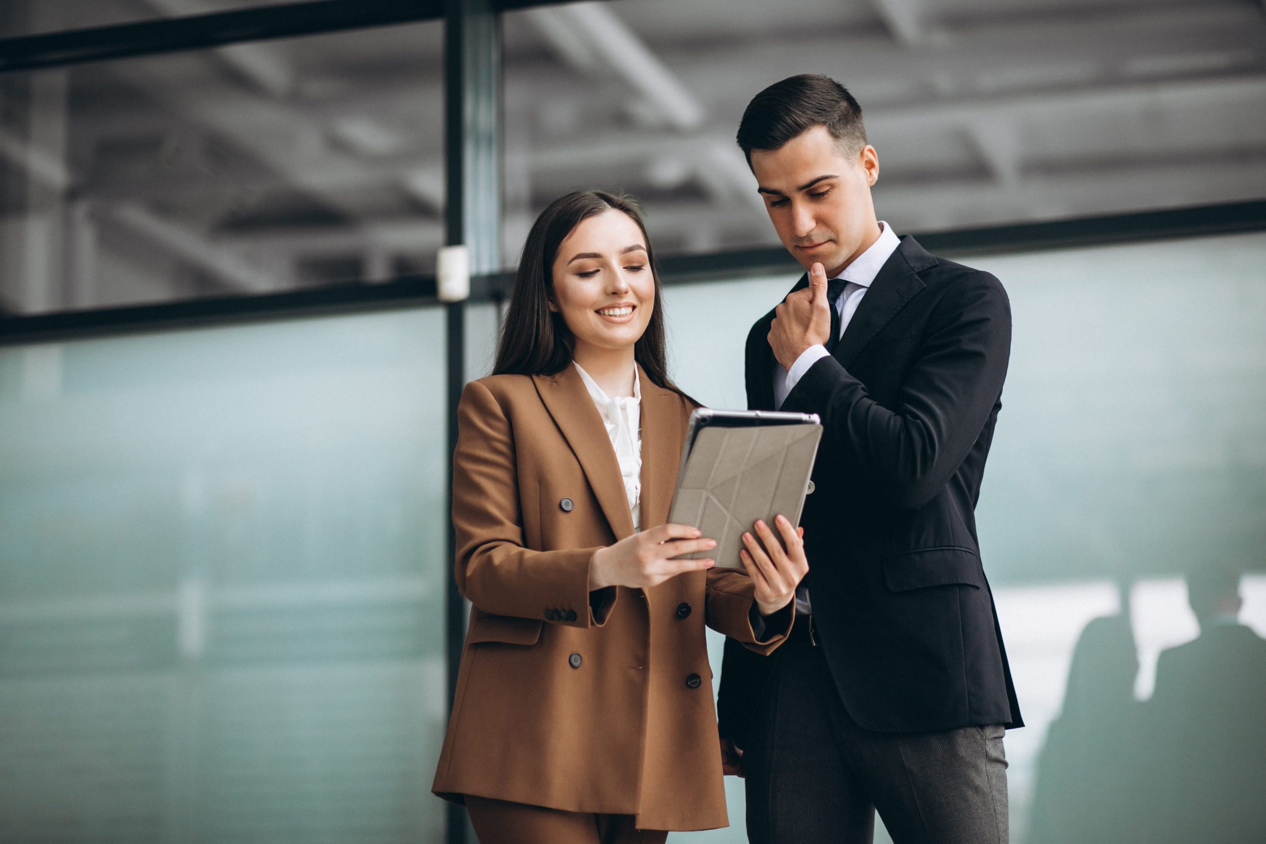 Girl showing report to a man