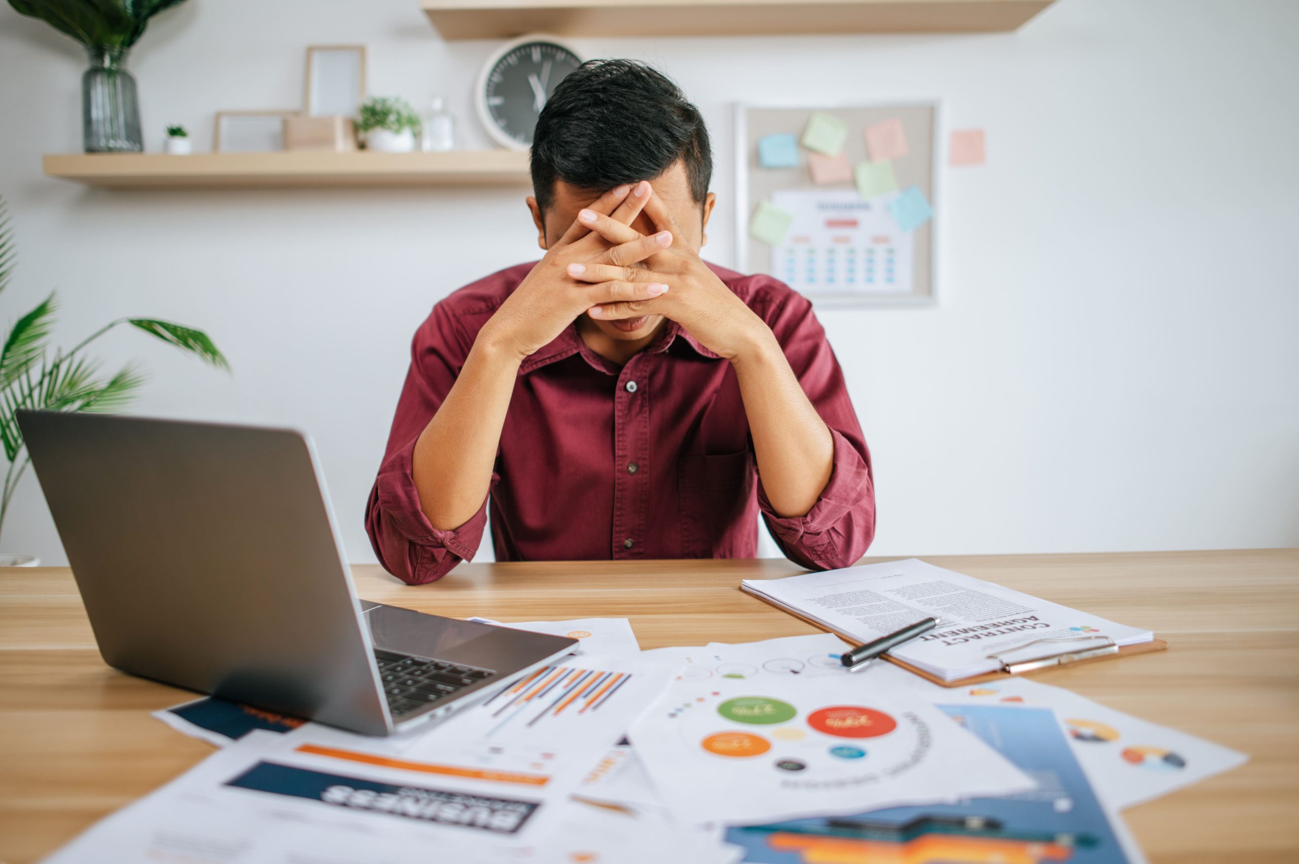 man stressed at work