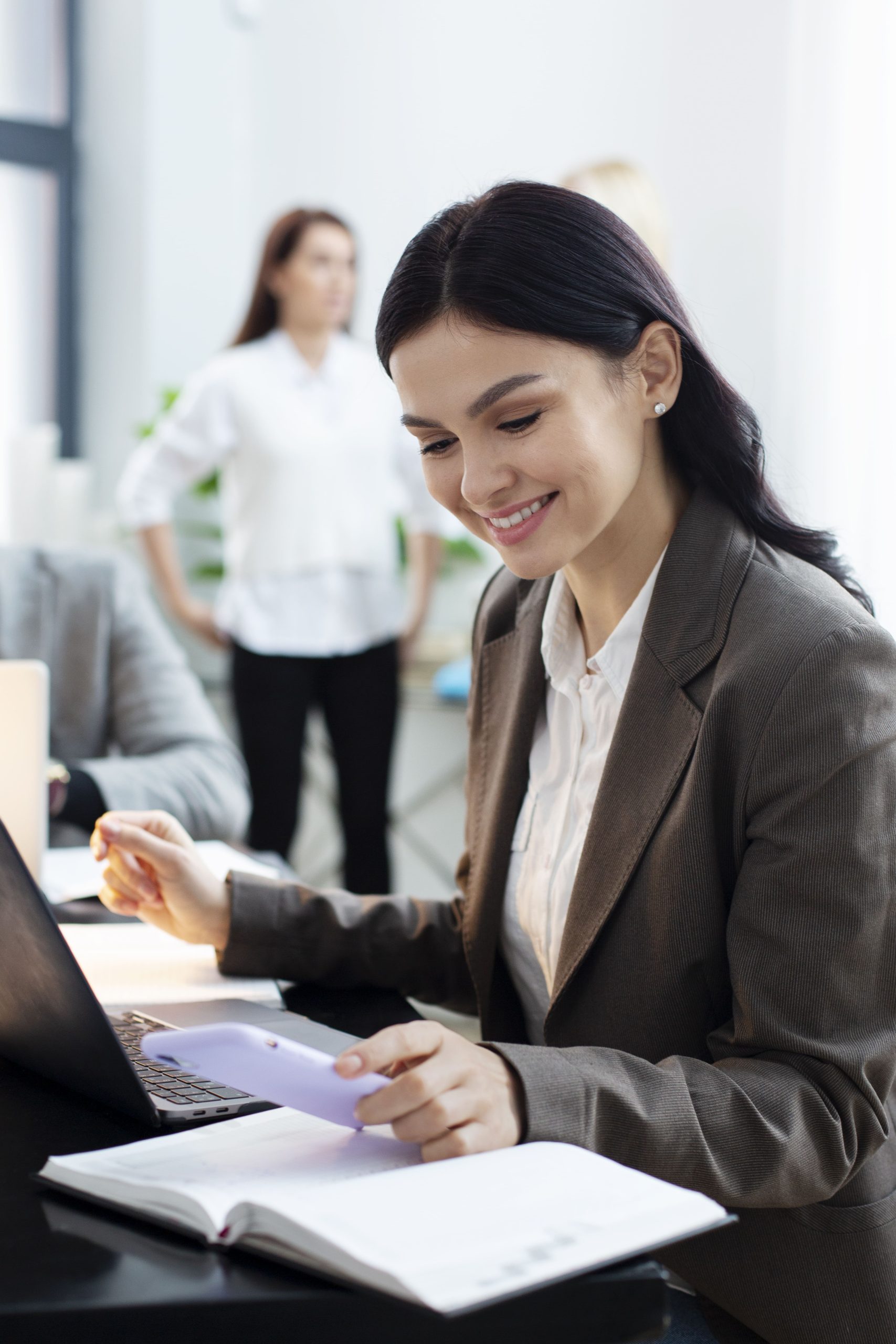 woman working on the reports smiling