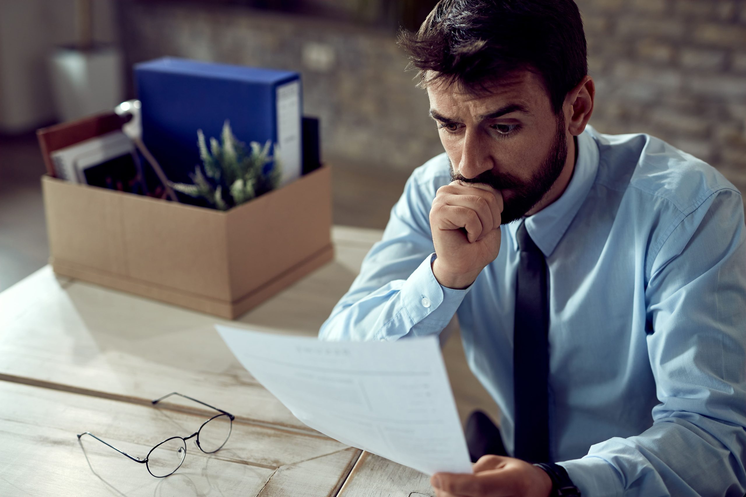 men frustrated while payroll filling