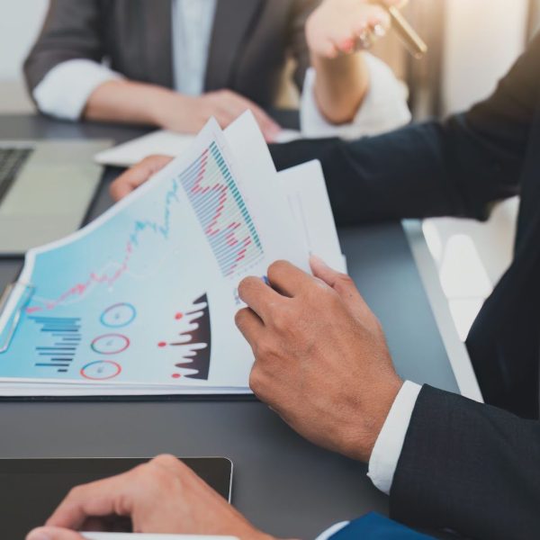 Accountants analysing company's financial report
